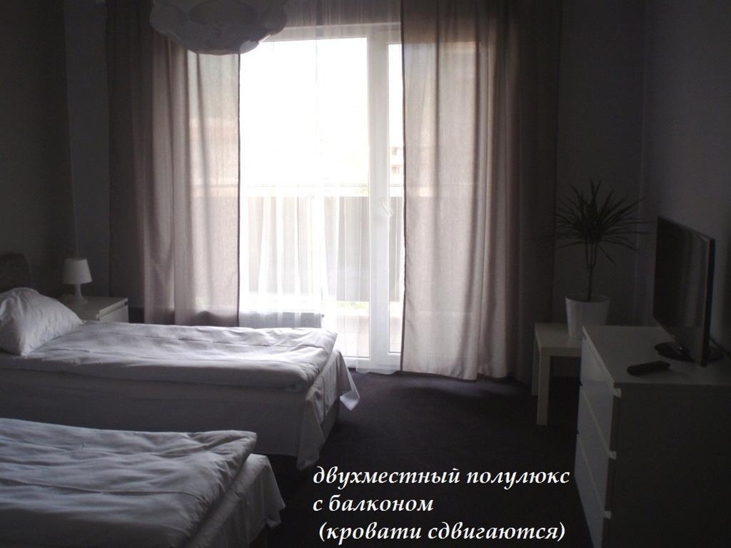 Rakhiv Hotel & Apartments Стая снимка